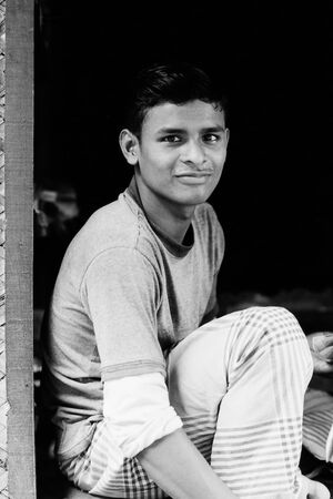 Man relaxing at entrance