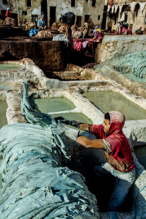 Man working in tanning pit