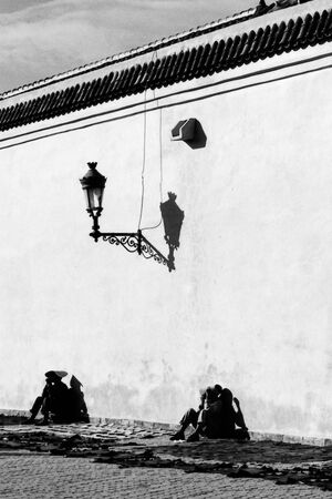 Figures against wall