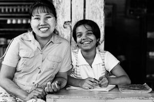 Woman and girl smiling