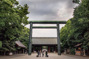 Men in front of Torii