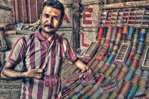 Man selling bracelets