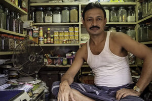 Man working in spice shop