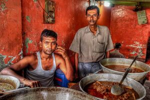 Men selling curry