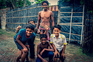 Boys gathering in front of camera