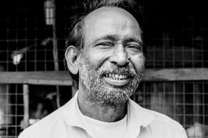Man smiling gently