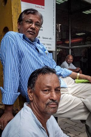 Men at entrance of post office