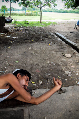 Man sleeping on bench