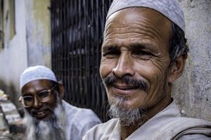 Men wearing taqiyah