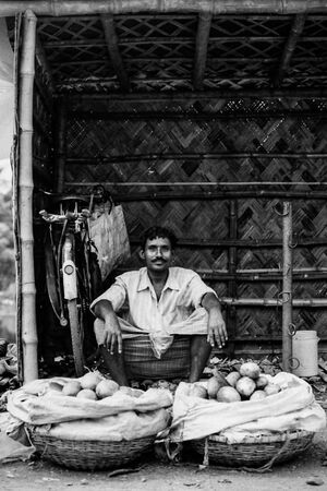 Man selling mangoes