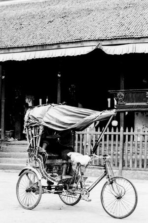 Cycle rickshaw with a hood