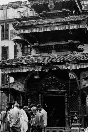 People in front of a Hindu temple