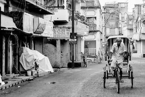 Cycle rickshaw in deserted street