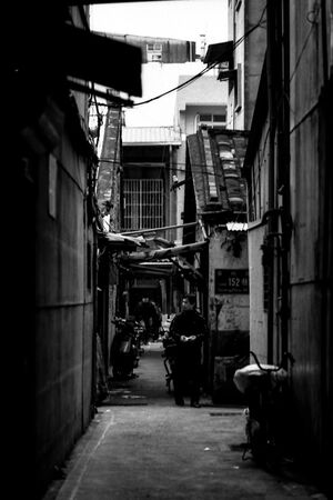 Figure in dim lane
