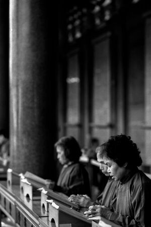 Women reading script