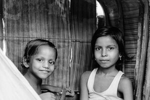 Kids on seat of cycle rickshaw