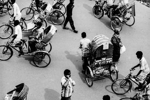 Street crowded with cycle rickshaw