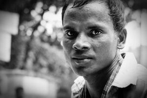 Sweltering rickshaw man