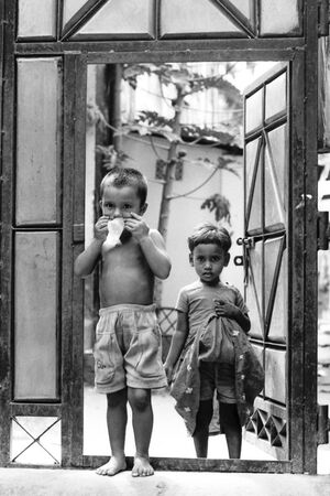 Kids in front of gate