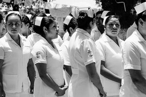 Nurses wearing a nurse's cap