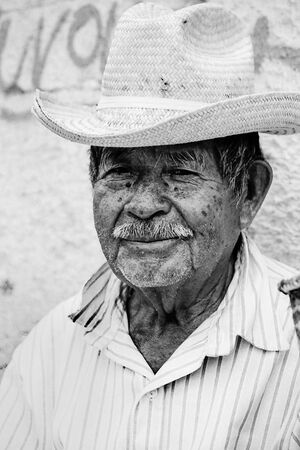 Old man wearing cowboy hat
