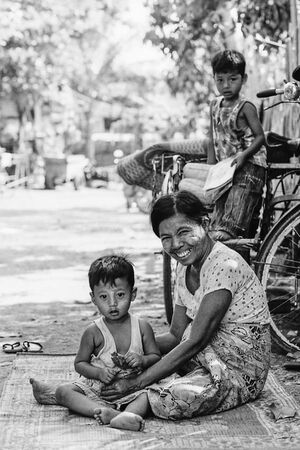 Grandmother and boy on the mat