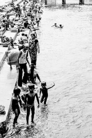 People on riverbank