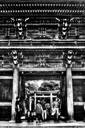 Worshipers passing through gate