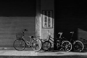 bicycles in front of shutter