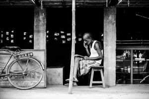 Man reading newspaper