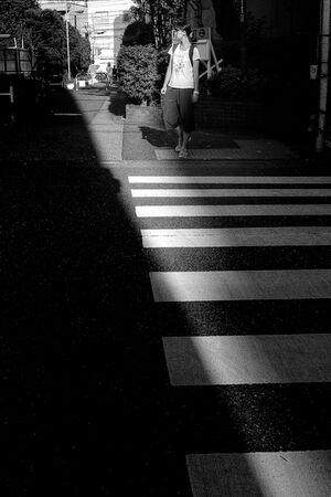Girl waiting for traffic light