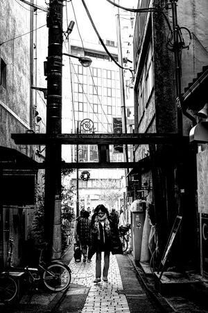 Woman under Torii