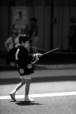 Boy having pole