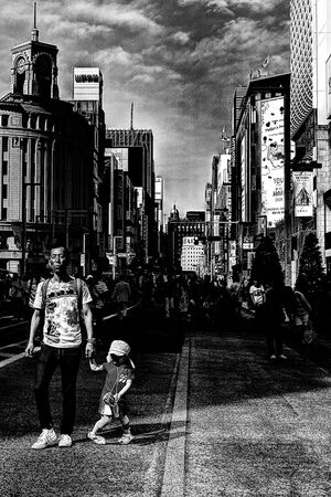 Parent and child in pedestrian paradise
