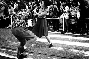 Women dancing in street