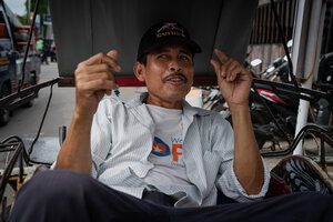 Becak driver with mustache