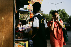 Woman walking while talking on cell phone