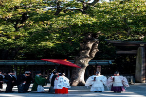 Shinto priests at front