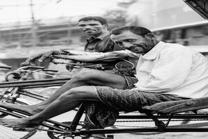 Smile of resting rickshaw wallah