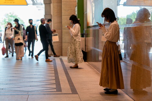 People waiting at the Marunouchi Central Exit ticket gate