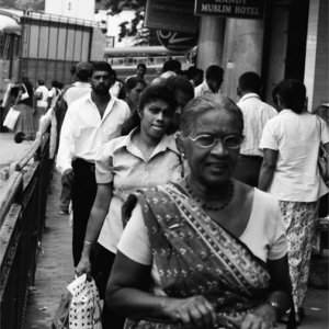Woman walking with wearing saree