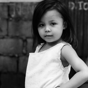 Little girl posing like a model