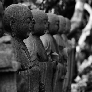 Statues of jizo standing together