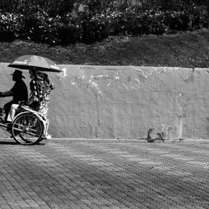 Trishaw passing by