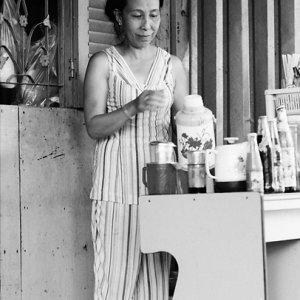 Woman making coffee