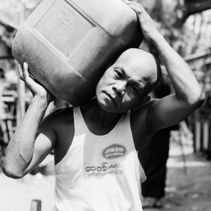 Man carrying container