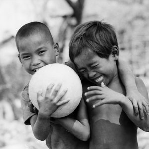 Two boys and one football