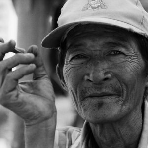 Man puffing cigar