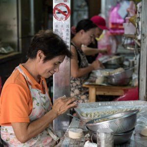 Some women making dumplings