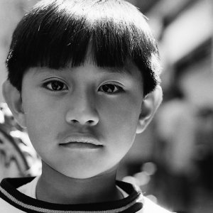 Boy with long-slitted eyes